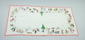 Image: Embroidered bureau scarf with scenes of Inuit figures, trees, and suns